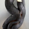 Sculpture en bois brulé par l'artiste Frédéric Ansermet.