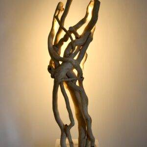 Luminaire LED en bois brut et naturel par le sculpteur et artiste français Frédéric Ansermet
